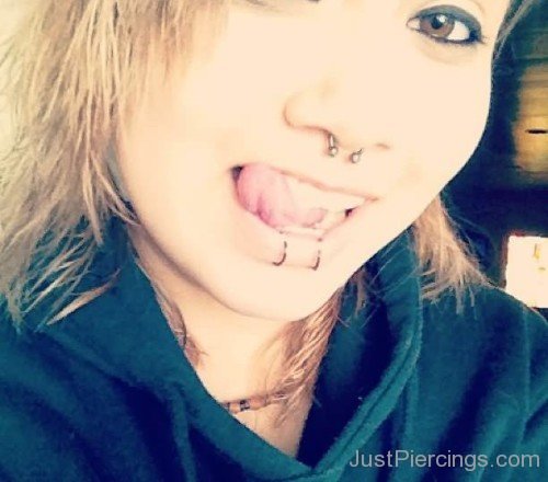 Septum Nose And Dolphin Bites Piercing