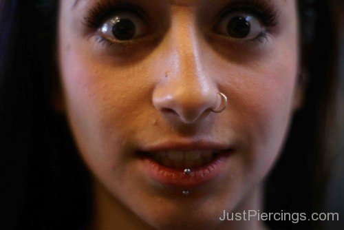 Vertical Labret And Nostril Piercings