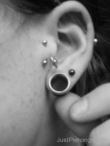 Vertical Tragus And Lobe Piercing Pic