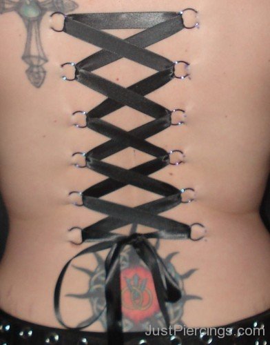 Tattoos And Corset Piercing On Back-JP123