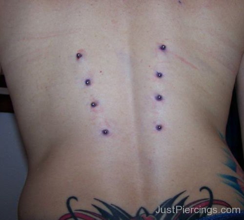 Lowerback Tattoo And Back Body Piercing With Studs-JP12326