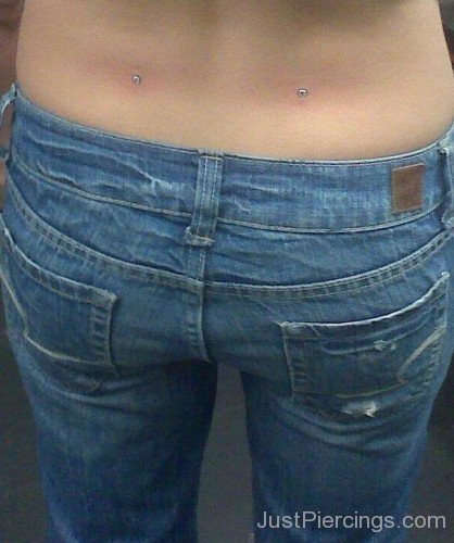 Awesome Back Dimple Piercing On Girl Lower Back