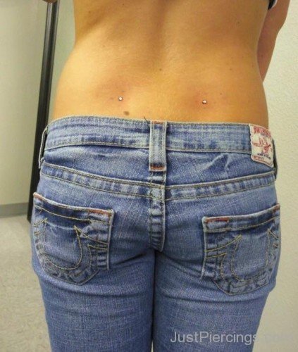 Back Dimple Piercing With Microdermal Anchor