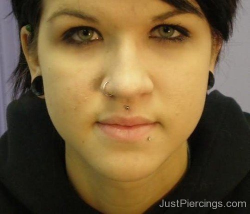 Beautiful Girl Showing Her Medusa, Ear and Nose Multiple Piercings-JP12304