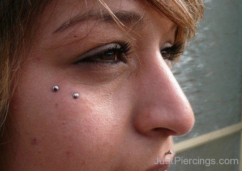 Butterfly Kiss Piercing On Girl Right Side