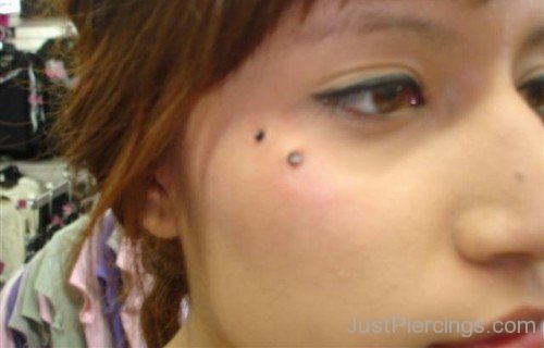 Butterfly Kiss Piercing With Dermals