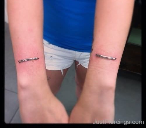 Staple Piercing On Girl Both Arms.-JP12312