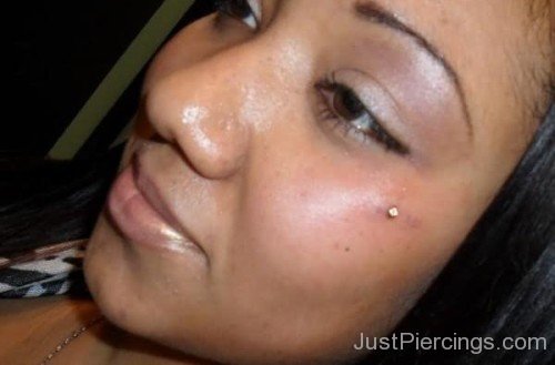 Teardrop Piercing On Girl Face Left Side-JP12333