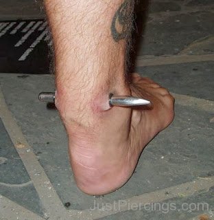 Achilles Piercing On Ankle 