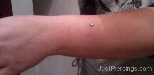 Arm Piercing With Single Labret Stud