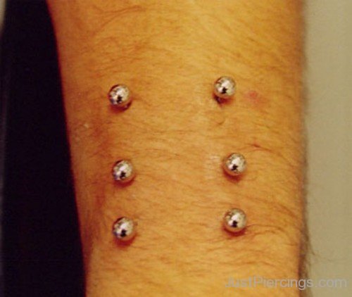 Arm surface Piercing