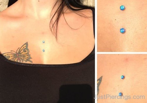 Butterfly Tattoo And Sternum Piercing