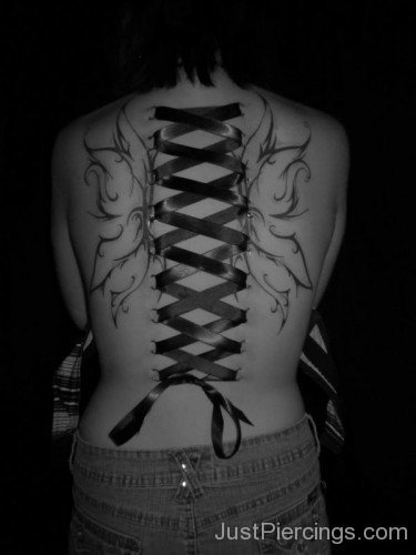 Butterfly Tattoos And Corset Piercing On Back