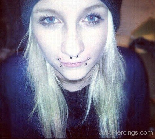 Canine Bites And Septum Piercing Picture