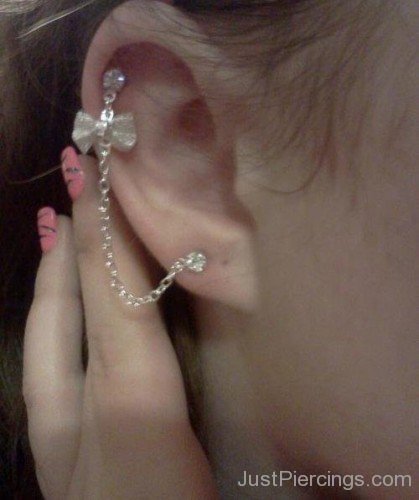 Cartilage Piercing With Bow Ear Rings