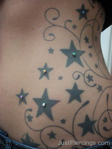 Dermal piercings in the star Tattoos