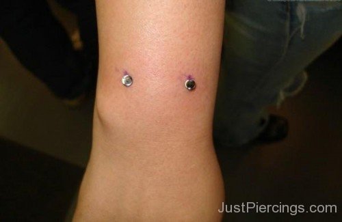 Dual Arm Piercing With Studs