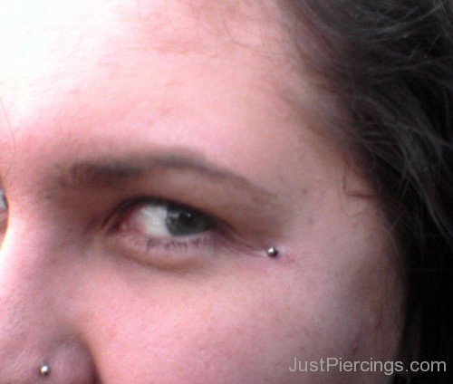 Eye And Nose Piercing