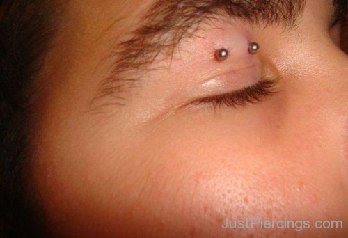 Eyelid Piercing With Barbell