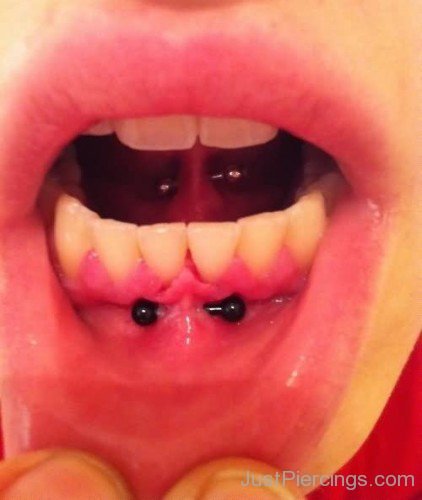 Frowny Piercing With Black Barbells