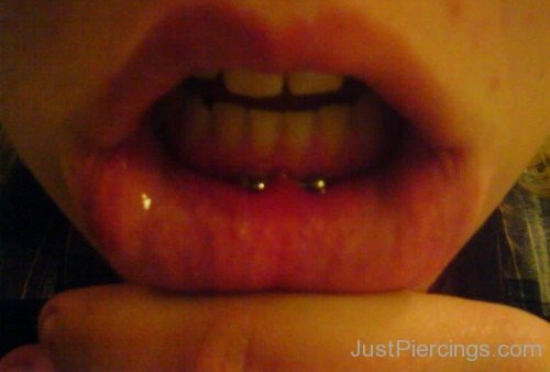 Frowny Piercing With Gold Barbell