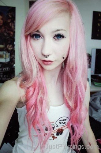 Girl With Pink Hair Wearing A Septum Ring, Dimple Piercing