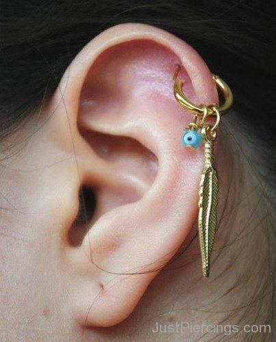Gold Feather Cartilage Piercing