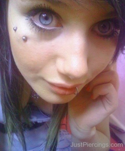 Lower Lip and Surface Butterfly Kiss Piercing