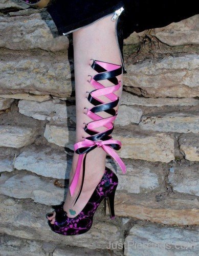 Pink And Black Ribbon Corset Leg Piercing