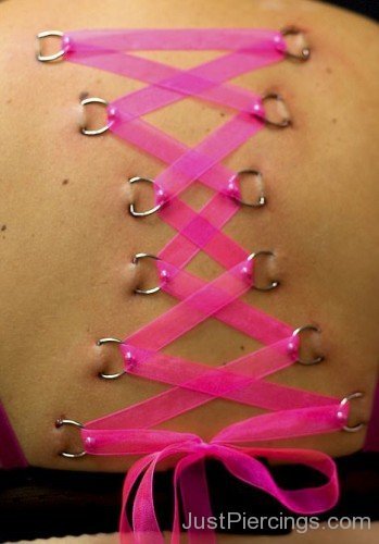 Pink Corset piercing