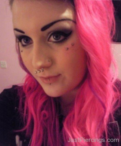 Septum, Lip And Butterfly Kiss Piercing