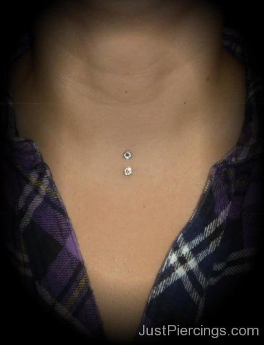 Sternum Piercing With Silver Dermal Anchors