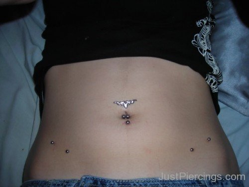 Stomach And Hip Piercing