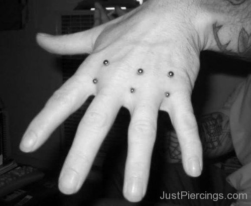 Surface Barbell Knuckle Piercing