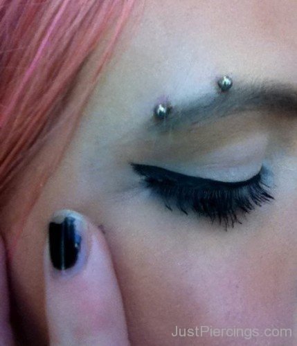 Surface Cat Eye Piercing With Barbell
