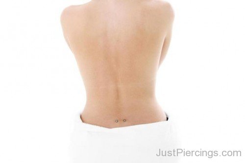 Surface Lower Back Piercing