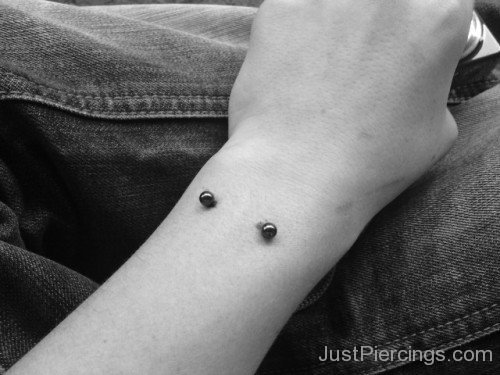 Surface Wrist Piercing With Black Barbell