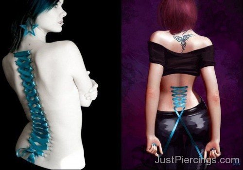 Tribal Tattoo And Blue Ribbon Corset Piercing On Back
