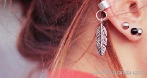 Triple Lobe And Silver Feather Earring Piercing
