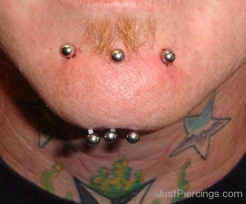 Tripple Chin Piercing With Gold Barbells