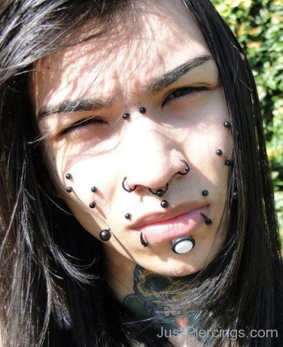 Whole Face And Devil Bites Piercing