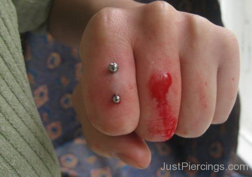 knuckle Surface Piercing