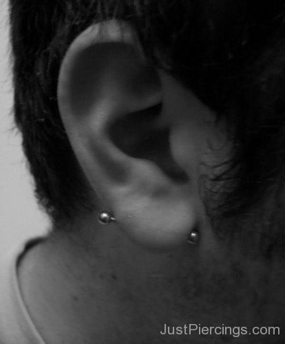 Transverse Lobe Piercing With Straight Barbell For Men