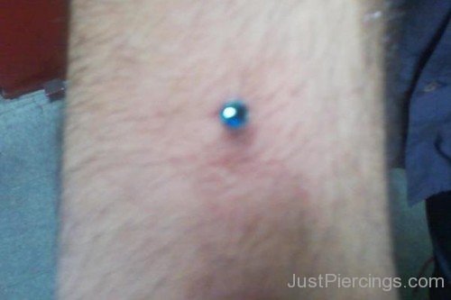 Arm Piercing With Blue Labret Stud-JP111