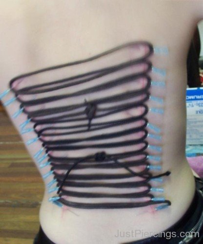 Awesome  Corset Piercing On Back-JP12006