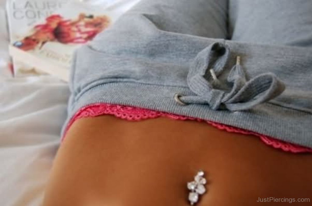 Belly Piercing With Flower Belly Ring.