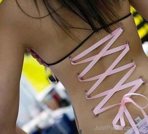 Corset Piercing On Back With Pink Ribbon-JP12039