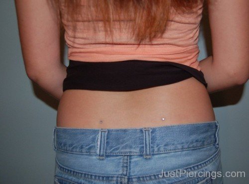 Dimple Piercing With Dermals On Girl Lower Back-JP12054