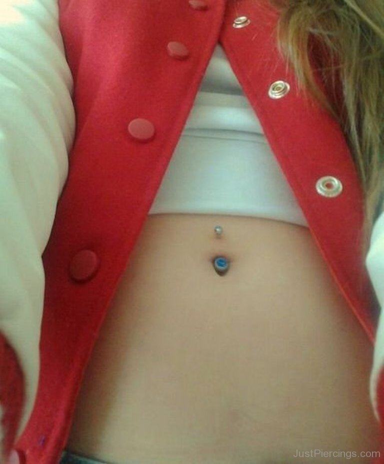 Girl in Red Jacket with Belly Piercing.