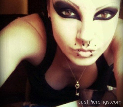 Image Of Septum And Canine Bites Piercings-JP14071